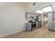 Charming kitchen featuring stainless steel appliances and light blue cabinets at 5725 Cedar Ave, Las Vegas, NV 89110