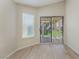 Cozy living room featuring a sliding glass door with backyard views at 5725 Cedar Ave, Las Vegas, NV 89110