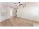 Neutral living room with a ceiling fan and hardwood floors at 5725 Cedar Ave, Las Vegas, NV 89110