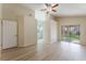 Large main bedroom with an ensuite bathroom and sliding glass door to the backyard at 5725 Cedar Ave, Las Vegas, NV 89110