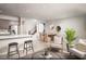 Bright living room features open floor plan, dining area, and access to the kitchen at 620 Bellus Pl # Lot 168, Henderson, NV 89015