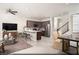 Bright living space with barstool seating, stainless appliances, and an adjacent dining area at 620 Bellus Pl # Lot 168, Henderson, NV 89015