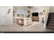 Bright living room with stylish decor, neutral tones, lots of light, and a staircase leading to upper level, for a modern feel at 624 Bellus Pl # Lot 170, Henderson, NV 89015