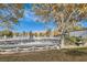 Scenic community park view featuring mature trees, picnic areas, and playground equipment at 6325 Guy Ave Ave, Las Vegas, NV 89131