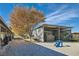 Exterior of horse facility with stalls, hay storage, and ample gravel space at 6325 Guy Ave Ave, Las Vegas, NV 89131