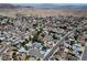Aerial view of neighborhood showcasing swimming pools in backyards at 652 Del Prado Dr, Boulder City, NV 89005