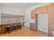 Stylish bar area with seating, modern cabinetry, and sleek countertops, perfect for entertaining at 652 Del Prado Dr, Boulder City, NV 89005