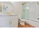 Beautiful bathroom with white vanity, updated fixtures, and a glass-enclosed shower at 652 Del Prado Dr, Boulder City, NV 89005