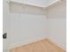 Walk-in closet featuring hardwood floors and a clean, organized space with shelving and ample storage at 652 Del Prado Dr, Boulder City, NV 89005