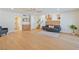 Open living area with hardwood floors, wet bar and contemporary decor creating a welcoming ambiance at 652 Del Prado Dr, Boulder City, NV 89005