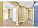 Upstairs hallway featuring a carpet runner and access to other rooms in the home at 6558 Musette Ave, Las Vegas, NV 89139