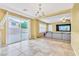 Bright living area featuring access to backyard patio and open view to living room at 6558 Musette Ave, Las Vegas, NV 89139