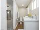 Bathroom featuring white cabinets and modern fixtures at 67 Oklahoma Dr, Henderson, NV 89015