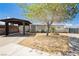 Charming home featuring a well-maintained front yard, covered carport, and inviting curb appeal on a sunny day at 67 Oklahoma Dr, Henderson, NV 89015