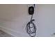 Close-up of the Emporia EV charger installed on the garage wall for electric vehicle charging at 6739 Twisted Wood Dr, Las Vegas, NV 89148