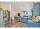 Modern kitchen featuring stainless steel appliances, a kitchen island, and an open-concept design at 6739 Twisted Wood Dr, Las Vegas, NV 89148