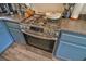 A stainless steel gas range stove offers multiple burners and oven for preparing gourmet meals at 6739 Twisted Wood Dr, Las Vegas, NV 89148