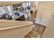 Aerial shot looking down to a kitchen, dining, and living area with wood floors at 6739 Twisted Wood Dr, Las Vegas, NV 89148