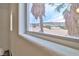 Window view of distant mountains and nearby palm trees at 6739 Twisted Wood Dr, Las Vegas, NV 89148