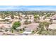 An aerial view of a community with mature landscaping and tile roofs at 7511 Bridlehorne Ave, Las Vegas, NV 89131