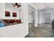 Entryway showing custom tile flooring, front door, and views to the living area and kitchen at 7511 Bridlehorne Ave, Las Vegas, NV 89131