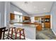 Spacious kitchen with granite countertops, stainless steel appliances, and a large island, perfect for cooking and entertaining at 7511 Bridlehorne Ave, Las Vegas, NV 89131