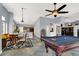 Open living area showcasing a pool table, dining table, and access to the kitchen at 7511 Bridlehorne Ave, Las Vegas, NV 89131