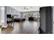 Spacious main bedroom with wood floors, large windows, and an ensuite bathroom at 7511 Bridlehorne Ave, Las Vegas, NV 89131