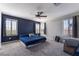 Spacious bedroom showcasing carpet floors, and shuttered windows ensuring ample natural light and comfort at 7732 Bandon Cliffs St, North Las Vegas, NV 89084