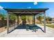Picturesque community gazebo with picnic tables providing a relaxing spot to enjoy the outdoors at 7732 Bandon Cliffs St, North Las Vegas, NV 89084
