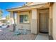 A quaint front porch with decorative suns and metal railing accents leads to the front entry at 7801 Olympus Ave, Las Vegas, NV 89131