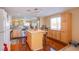 Spacious kitchen with an island and barstool seating plus ample counter and cabinet space at 7801 Olympus Ave, Las Vegas, NV 89131