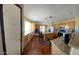 Well-equipped kitchen with an island, granite counters, and stainless steel appliances at 7801 Olympus Ave, Las Vegas, NV 89131