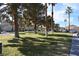 Expansive grassy area with mature trees and well-maintained landscaping at 7952 Diamond Rock Way # 102, Las Vegas, NV 89128