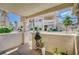A cozy outdoor patio space with stucco walls and gated access, offering a private retreat at 7952 Diamond Rock Way # 102, Las Vegas, NV 89128
