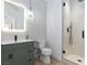 Stylish bathroom featuring a modern vanity, elegant lighting, and a glass-enclosed shower at 81 Alerion St, Las Vegas, NV 89138