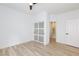 Unfurnished bedroom with wood floors, closet and ensuite bathroom at 81 Alerion St, Las Vegas, NV 89138