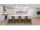 Modern kitchen featuring an island with bar seating and stainless steel appliances at 81 Alerion St, Las Vegas, NV 89138