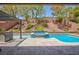 An inviting pool and spa area with a terraced garden at 81 Alerion St, Las Vegas, NV 89138