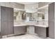 Spacious bathroom with double sink vanity and tile flooring for a luxurious feel at 8113 Gothic Ave, Las Vegas, NV 89117