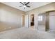 Large bedroom with carpeted floor, closet, and bathroom access at 8113 Gothic Ave, Las Vegas, NV 89117