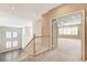 Spacious foyer featuring stairway, natural light, and an opening to an adjacent room at 8113 Gothic Ave, Las Vegas, NV 89117