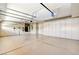 Spacious garage with epoxy floors, built in cabinets, and overhead storage at 8113 Gothic Ave, Las Vegas, NV 89117