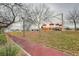 A park trail runs by a modern playground for Gathering fun at 8113 Gothic Ave, Las Vegas, NV 89117