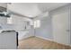 Renovated kitchen featuring contemporary white cabinets, modern appliances, and durable countertops at 813 E Bartlett Ave, North Las Vegas, NV 89030