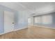 A spacious living room offers new floors, neutral paint, and windows for plenty of sunlight at 813 E Bartlett Ave, North Las Vegas, NV 89030