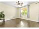 Cozy bedroom with natural light, hardwood floors, and a relaxing atmosphere at 8221 Stoneheather Ct, Las Vegas, NV 89117