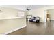 Living room with laminate flooring and ceiling fan at 8221 Stoneheather Ct, Las Vegas, NV 89117