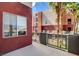 A cozy balcony perfect for relaxing with a view of the building exterior at 83 E Agate Ave # 207, Las Vegas, NV 89123