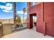 Inviting outdoor balcony with comfortable chairs and a view at 83 E Agate Ave # 207, Las Vegas, NV 89123